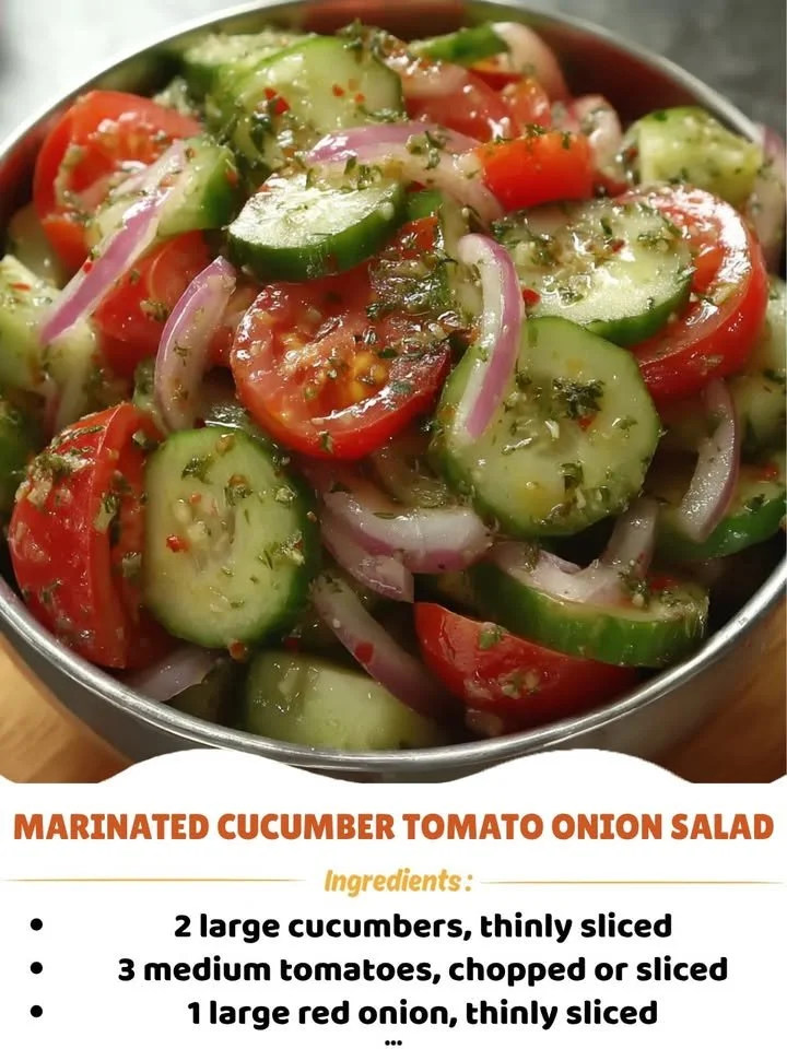 Fresh marinated cucumber tomato onion salad in a bowl, perfect for summer dishes.