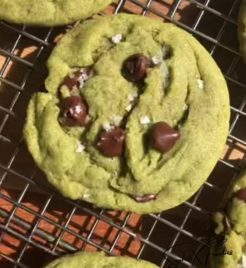 Freshly baked Matcha Chocolate Chip Cookies on a cooling rack