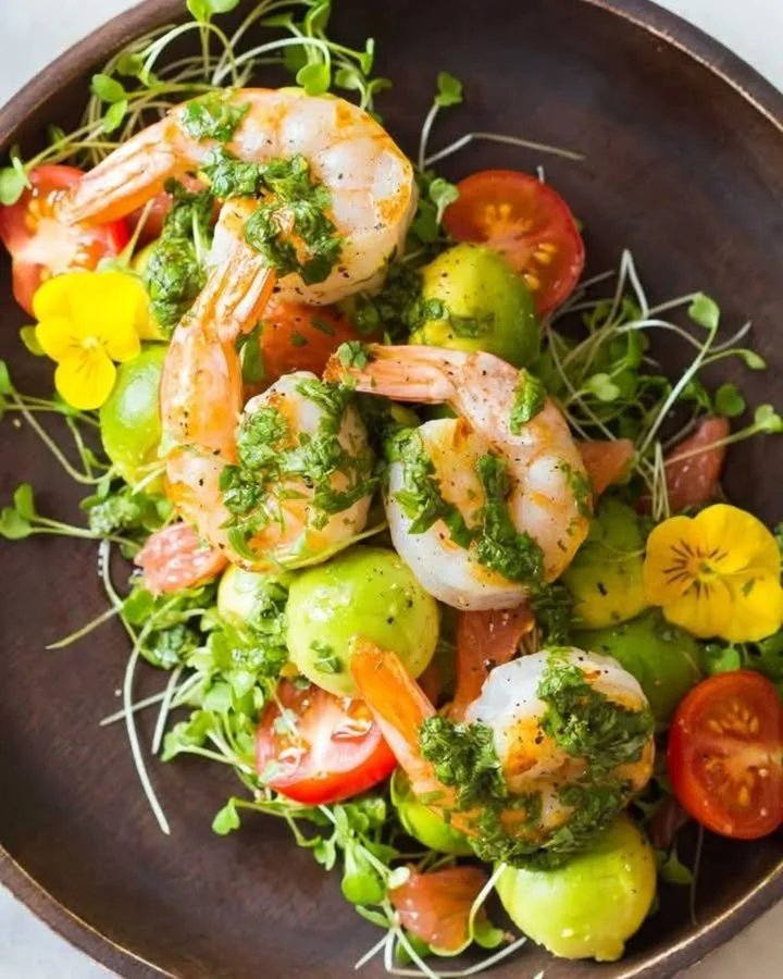 Mexican-style shrimp avocado salad with fresh ingredients and vibrant colors.