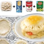Baked mini chicken pot pies served in ramekins, golden and flaky crusts.