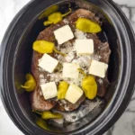 Delicious Mississippi Pot Roast served with vegetables and gravy