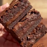 Delicious homemade Nutella brownies topped with chocolate drizzles