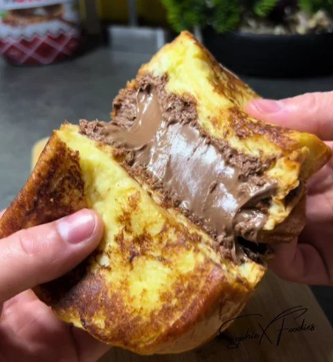 Delicious Nutella French Toast served with fresh berries on a plate.