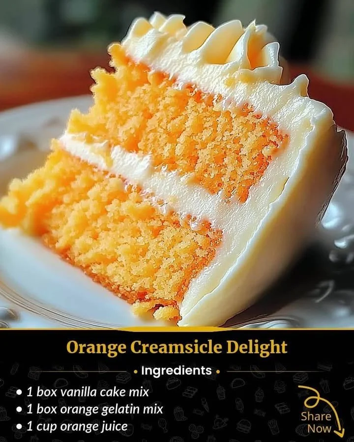 Delicious Orange Creamsicle Cake topped with orange slices and creamy frosting