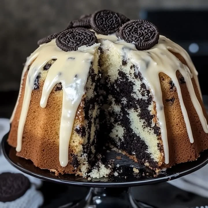 Slice of Oreo Pound Cake topped with crumbled Oreos