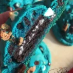Oreo stuffed cookie monster cookies with colorful sprinkles and chocolate chips