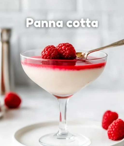 Delicious homemade Panna Cotta served with fresh berries on a dessert plate.