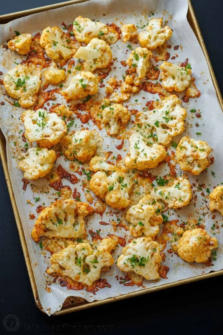 Oven-roasted cauliflower topped with Parmesan cheese