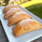 Peach Cobbler Donut Hand Pies freshly baked and ready to enjoy