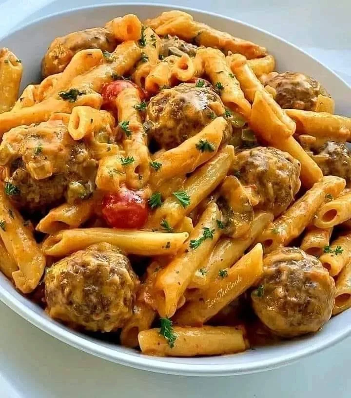 Delicious Penne Pasta with Meatballs served in marinara sauce