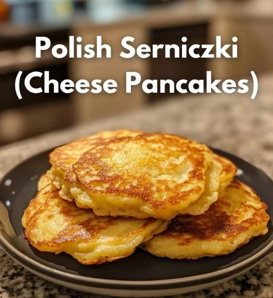 Delicious Polish cheese pancakes served with toppings on a plate.