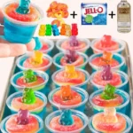Vibrant jello shots ready for a pool party.