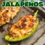 Sausage stuffed jalapeños on a platter, ready to serve as appetizers.