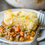 Delicious homemade Shepherd's Pie with golden mashed potato topping.