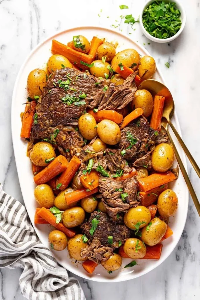 Delicious slow cooker pot roast served with vegetables