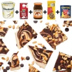 Delicious Snickers Frozen Bark dessert topped with chocolate and peanuts.