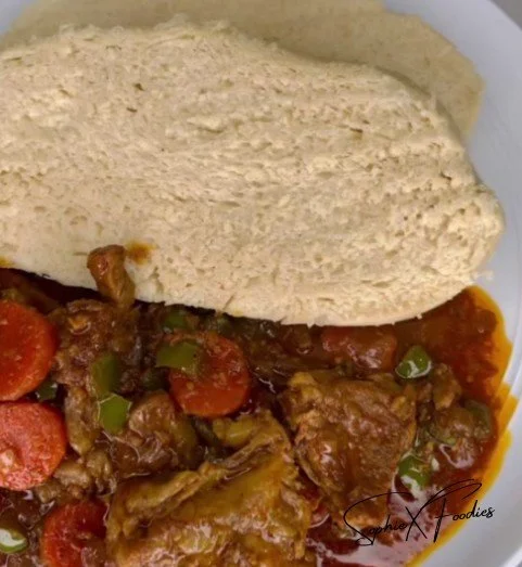 Fluffy and delicious homemade steamed bread on a wooden table.