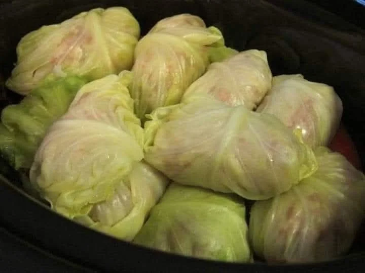 Delicious stuffed cabbage rolls ready to serve with a rich tomato sauce
