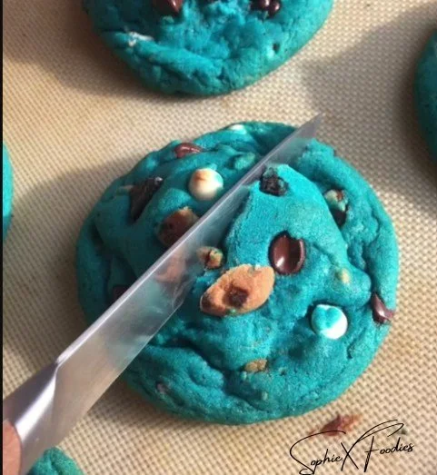 Delicious stuffed Cookie Monster cookies with colorful chocolate and creamy center