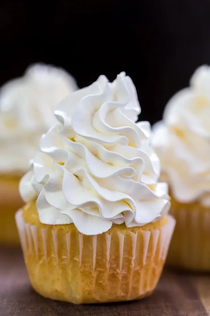 Delicious vanilla buttercream frosting on a homemade cake