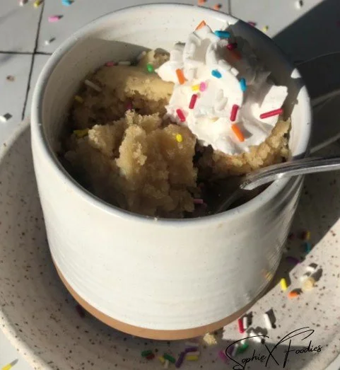 Delicious homemade vanilla mug cake in a white mug