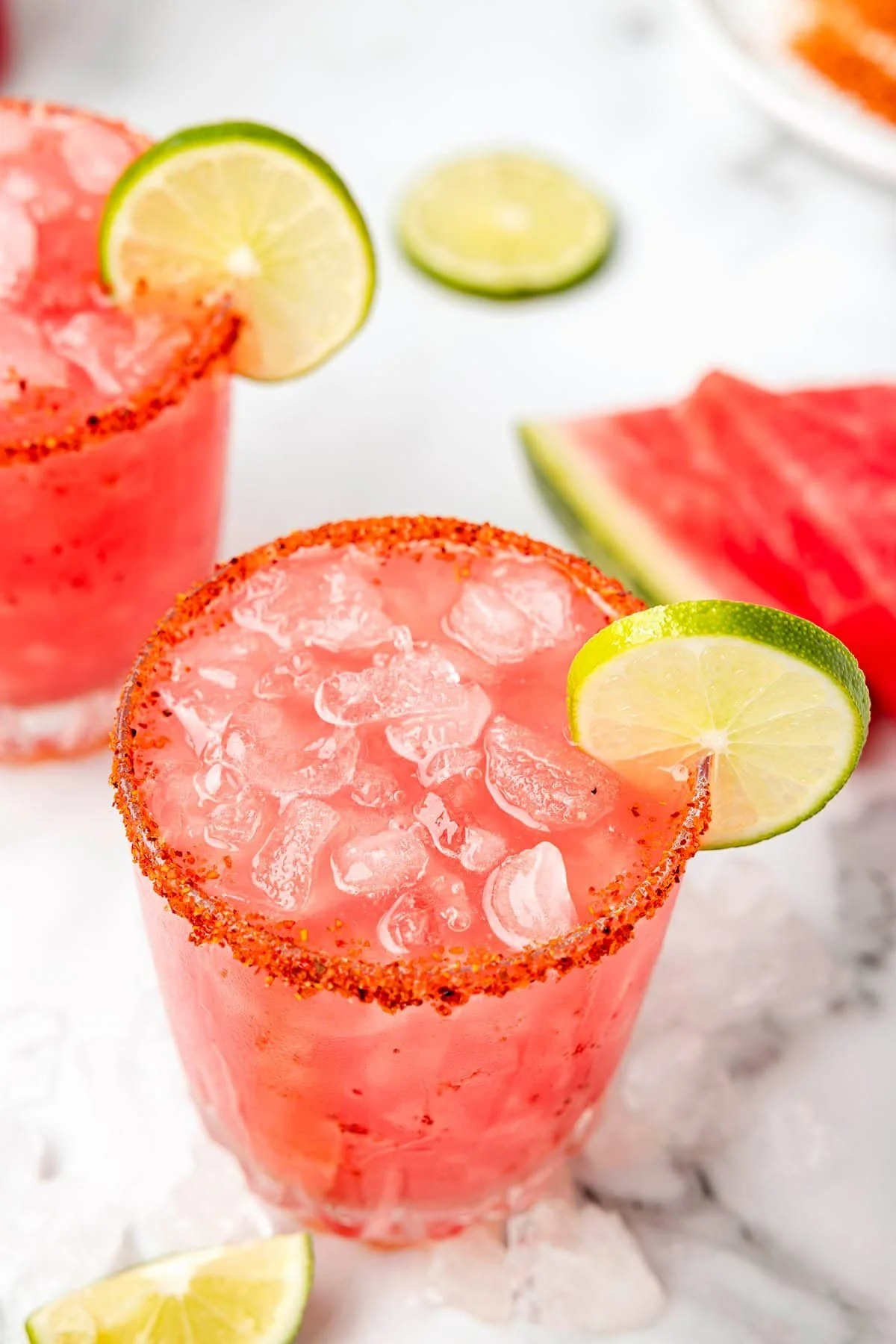 A refreshing Watermelon Margarita served in a glass with a slice of watermelon