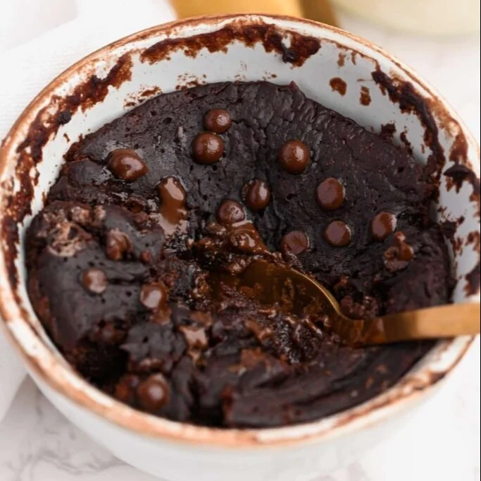 Delicious 100 calorie chocolate mug cake in a white mug