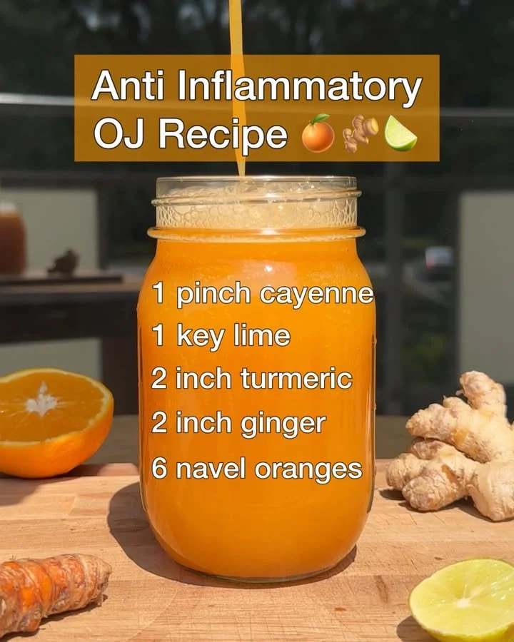 Glass of anti-inflammatory orange juice with fresh oranges on a wooden table
