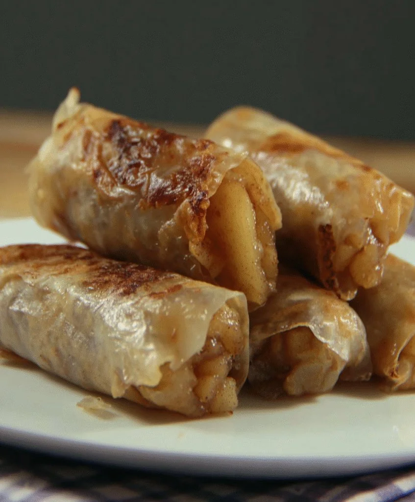 Baked apple pie rice paper rolls with fresh apples and cinnamon filling