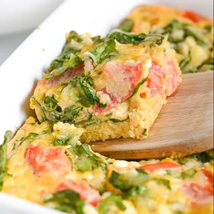 Baked cottage cheese eggs dish garnished with herbs