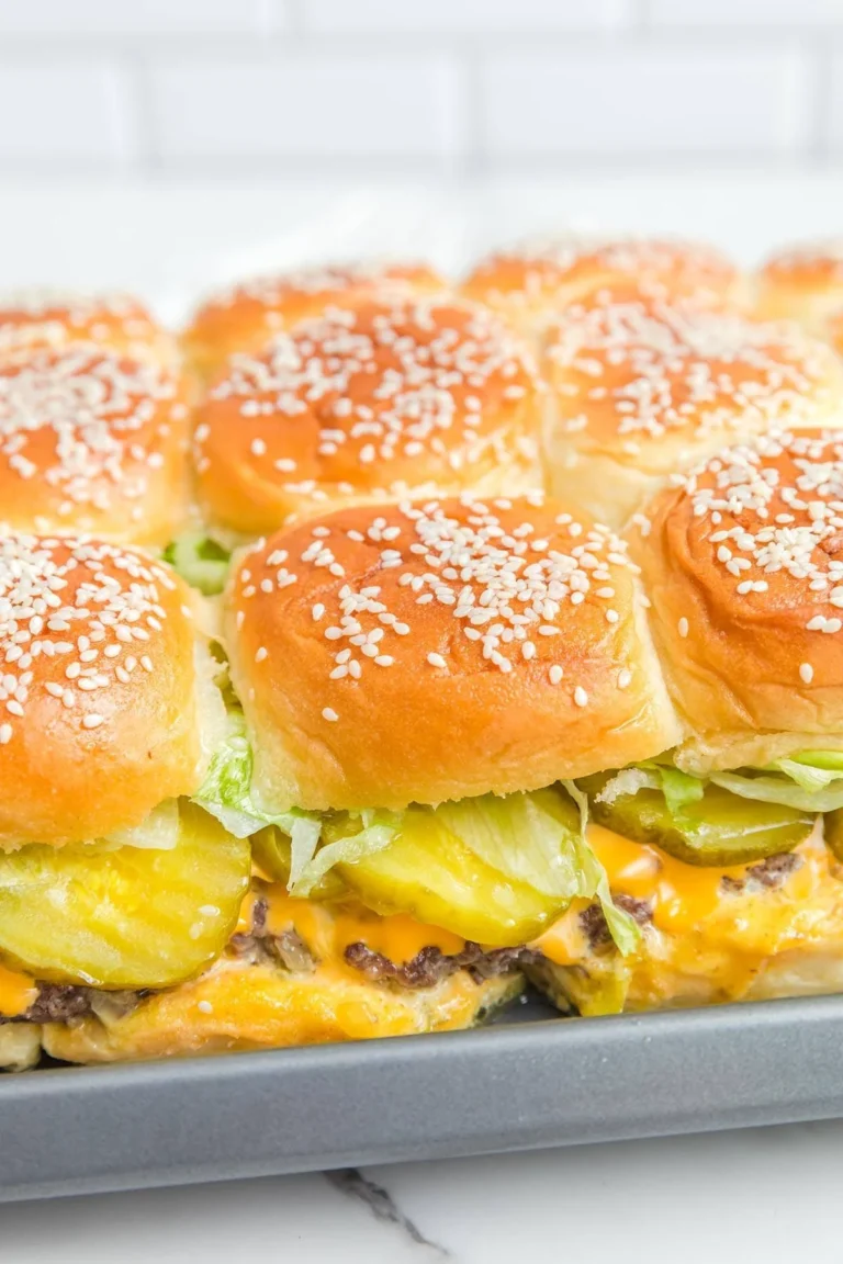 Serving of Big Mac sliders garnished with fresh ingredients