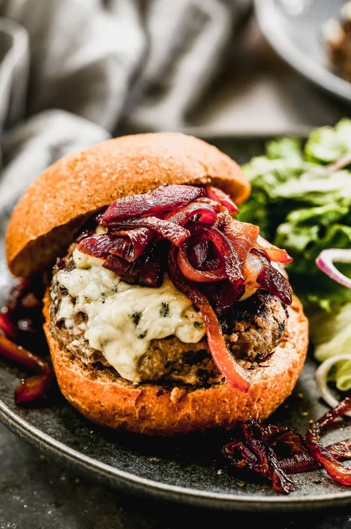 Gourmet Blue Cheese Burger with caramelized onion marmalade on a plate