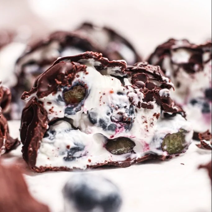 Blueberry yogurt clusters with fresh blueberries and yogurt coating.