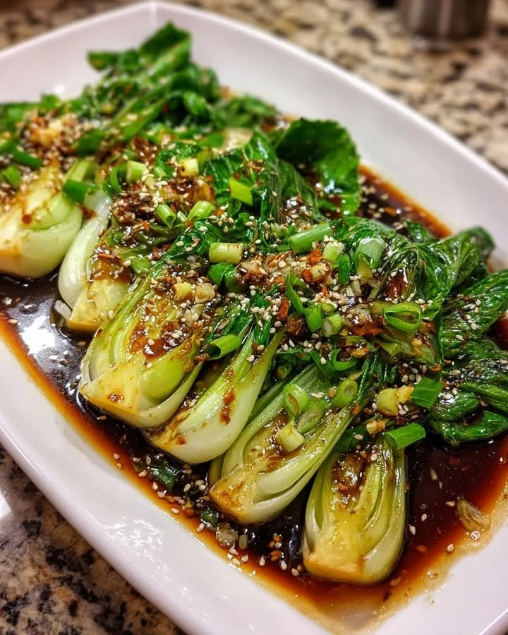 Bok Choy stir-fried with ginger and soy sauce in a vibrant dish