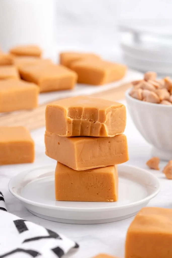 Delicious homemade butterscotch fudge on a wooden table