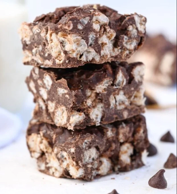 Delicious Chocolate Protein Rice Krispie Treats stacked on a plate