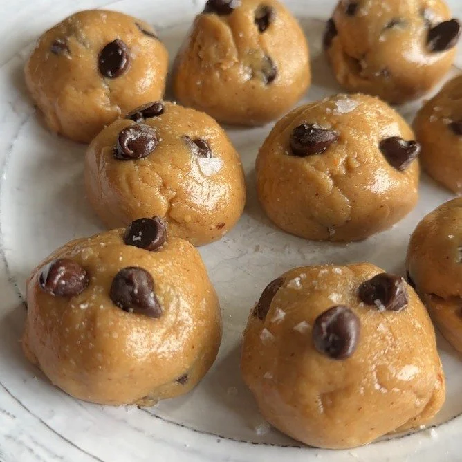 Delicious cookie dough protein bites in a bowl, ideal for snacking.