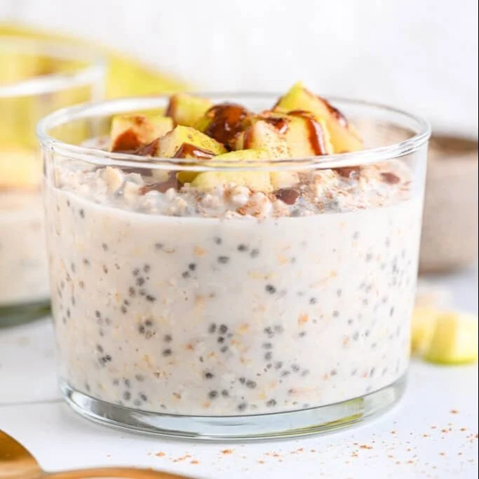 Delicious bowl of cottage cheese overnight oats topped with fruits and nuts