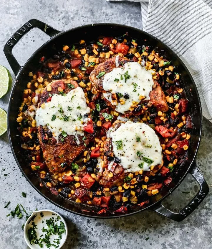 Succulent Cowboy Chicken with spices and herbs served on a rustic plate.