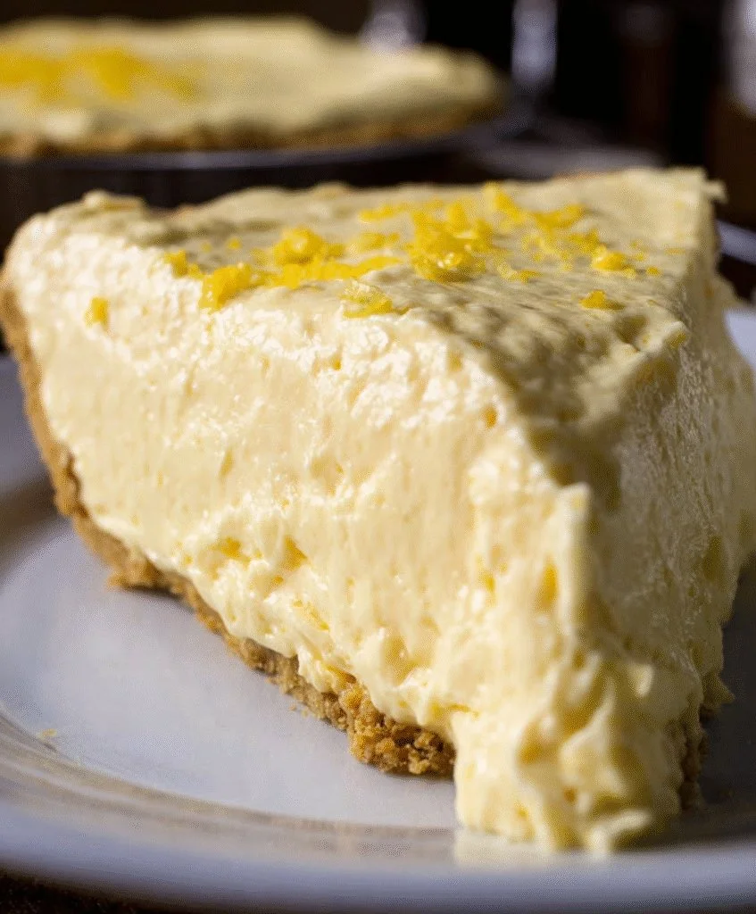 Delicious cream cheese lemonade pie slice garnished with lemon slices