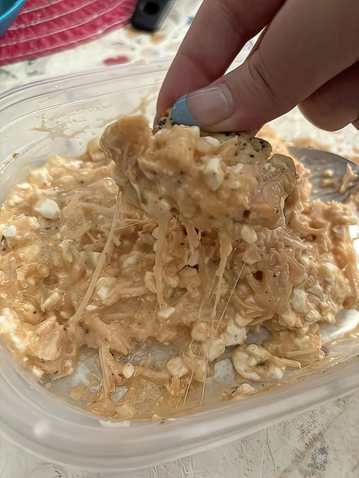 Creamy Buffalo Chicken Dip served in a bowl with celery sticks