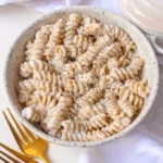 Creamy Greek yogurt pasta sauce served over pasta in a bowl