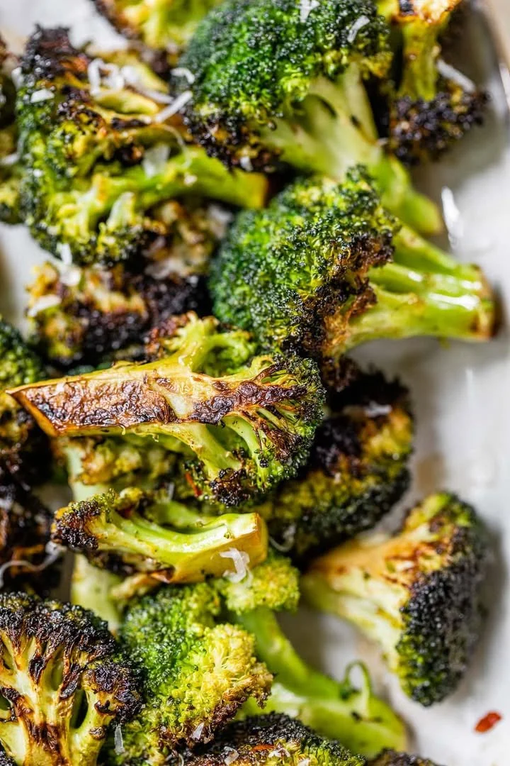 Crispy caramelized grilled broccoli served on a plate