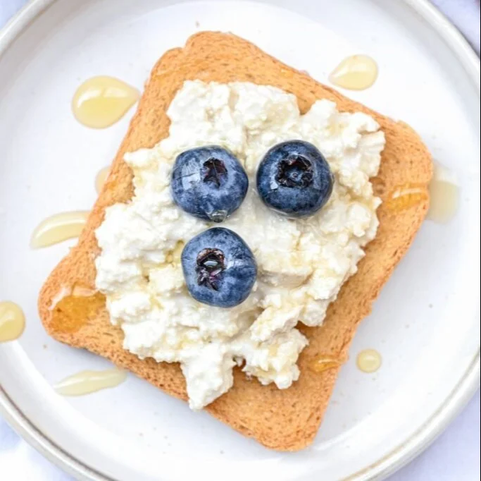 Bowl of creamy Dairy-Free Cottage Cheese with fresh fruits