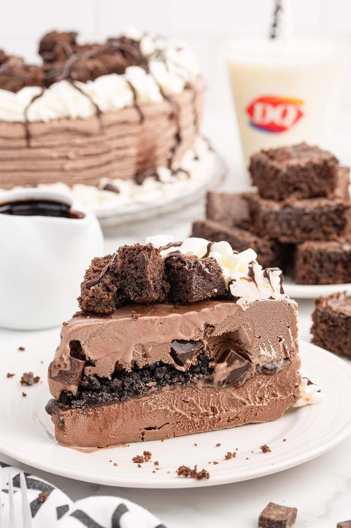 Delicious Dairy Queen-inspired chocolate ice cream cake with layers of fudge and cream