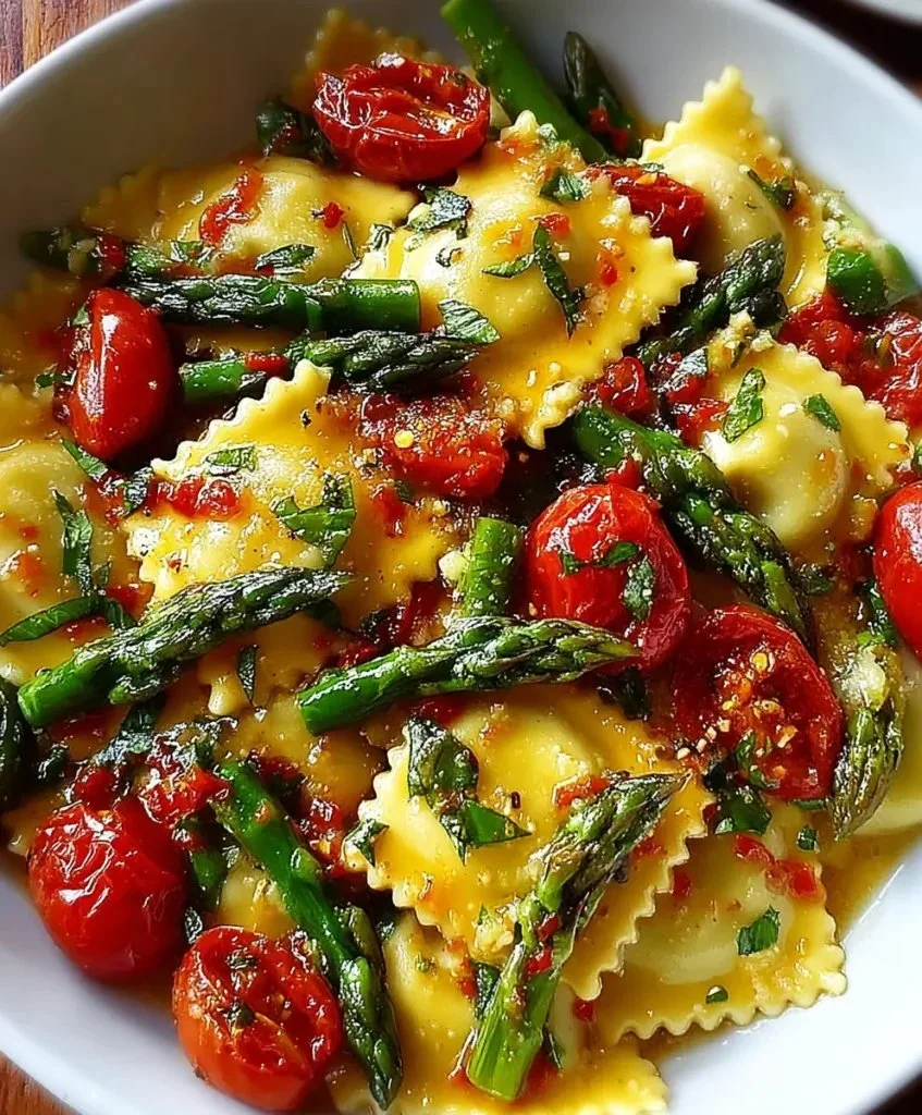 Fresh spring ravioli filled with asparagus and tomatoes