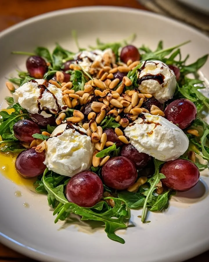 Grape Ricotta Salad with Pine Nuts and Balsamic dressing on a plate.