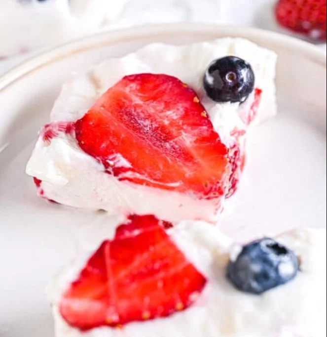 Delicious Greek yogurt bars on a wooden table with fresh fruits