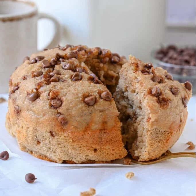 Delicious Greek Yogurt Cake served on a rustic wooden table.