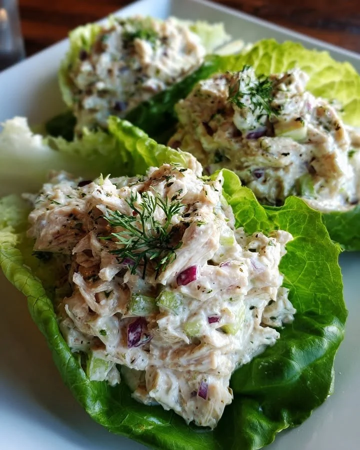 Greek yogurt chicken salad lettuce wraps served on a plate